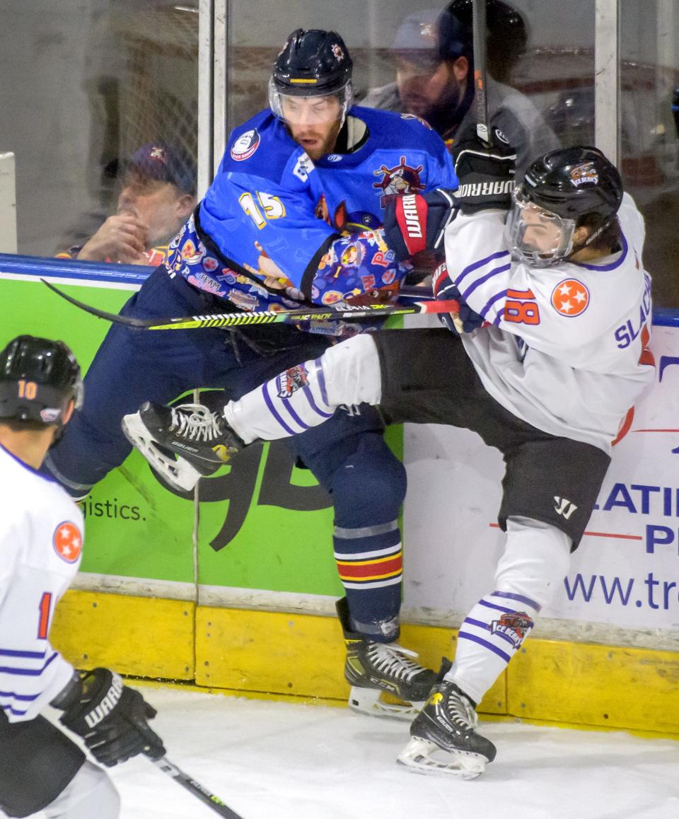 Rivermen winger Alex Carrier (15) shoves Knoxville's Nolan Slachetka during their game Saturday, Jan. 14, 2023 at Carver Arena. The Rivermen defeated the Ice Bears 5-2.