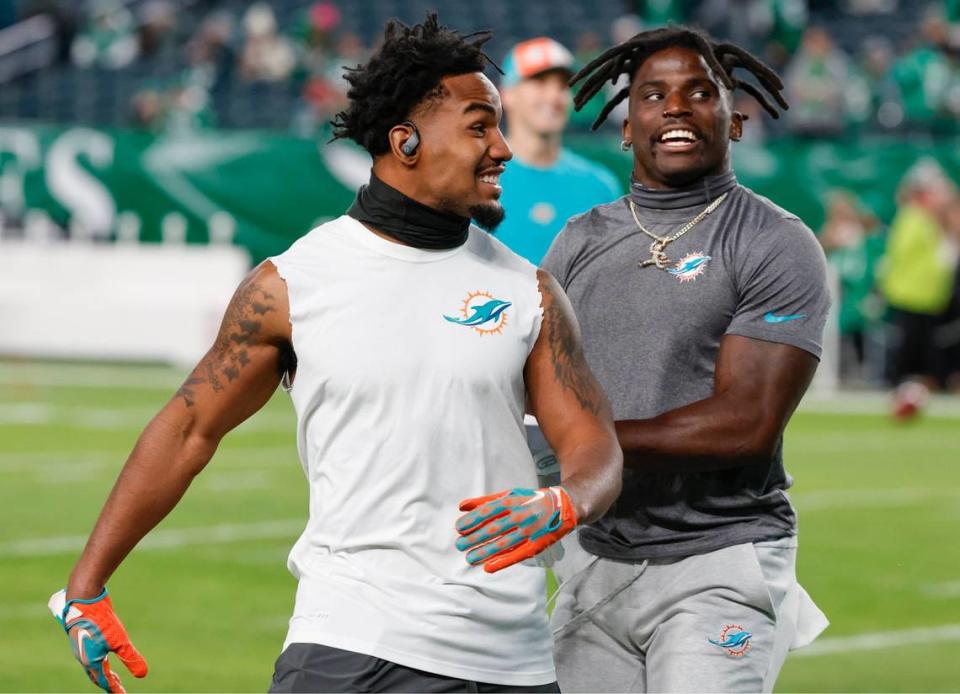 Miami Dolphins wide receiver Jaylen Waddle (17) and Miami Dolphins wide receiver Tyreek Hill (10) run through warmups before the start of the game against the Philadelphia Eagles at Lincoln Financial Field, Philadelphia, PA on Sunday, October 22, 2023.