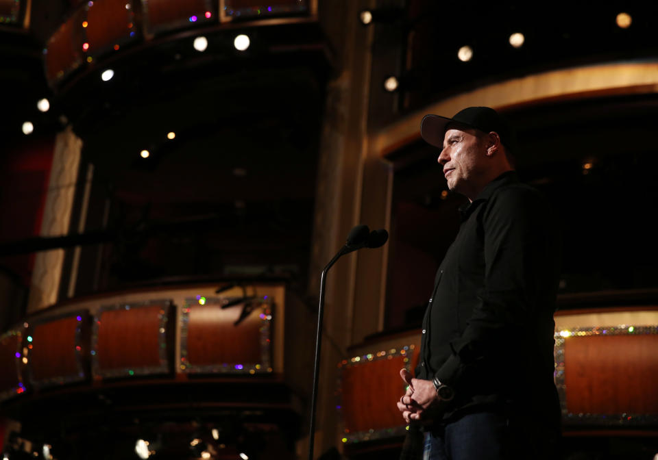 John Travolta is seen onstage during rehearsals for the 86th Academy Awards in Los Angeles, Saturday, March 1, 2014. The Academy Awards will be held at the Dolby Theatre on Sunday, March 2. (Photo by Matt Sayles/Invision/AP)