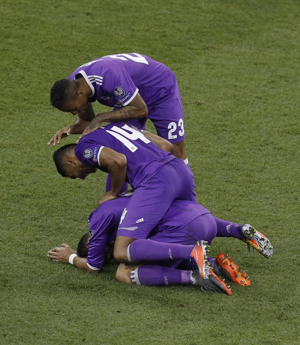 <p>Britain Soccer Football – Juventus v Real Madrid – UEFA Champions League Final – The National Stadium of Wales, Cardiff – June 3, 2017 Real Madrid’s Cristiano Ronaldo, Danilo and Casemiro celebrate after winning the UEFA Champions League Final Reuters / Phil Noble Livepic </p>