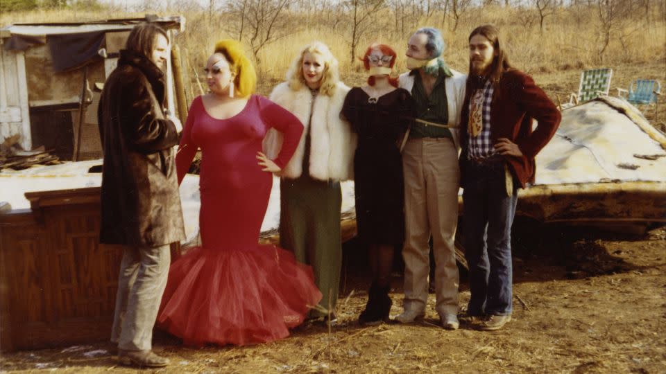 The cast of "Pink Flamingos," photographed during filming in 1972. - Lawrence Irvine/Warner Bros./Courtesy Academy Museum Foundation