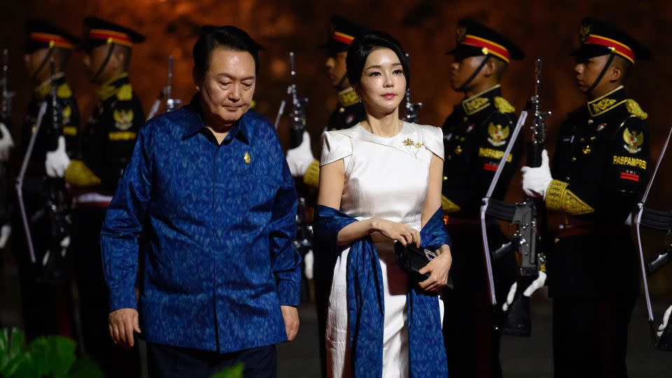 President Yoon Suk-yeol and First Lady Kim Keon Hee arrive for a formal dinner at the G20 Summit on November 15, 2022 in Bali, Indonesia. - Leon Neal/Getty Images