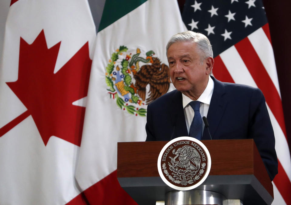 Mexico's President Andres Manuel Lopez Obrador speaks during an event to sign an update to the North American Free Trade Agreement, at the national palace in Mexico City, Tuesday, Dec. 10. 2019. (AP Photo/Marco Ugarte)