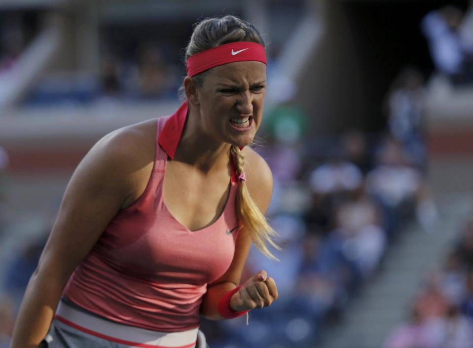 Azarenka of Belarus celebrates a point against Serena Williams of the U.S. during their women's singles final match at the U.S. Open tennis championships in New York