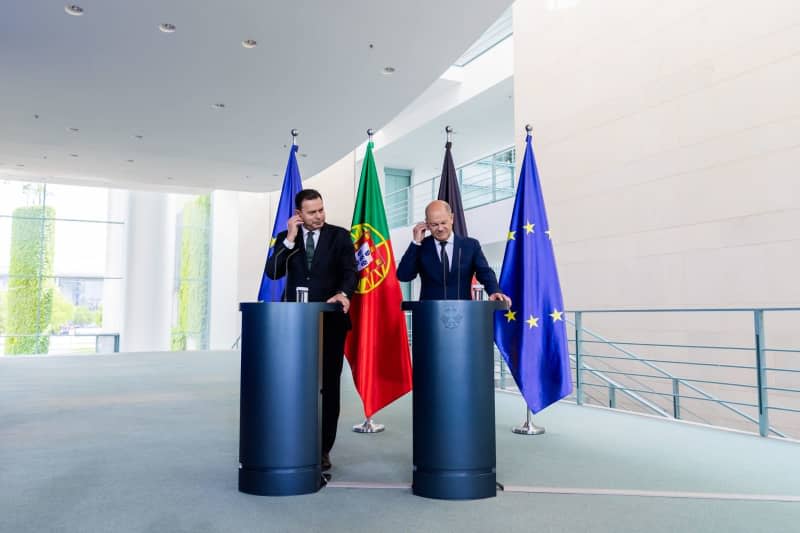 Germany's Chancellor Olaf Scholz (R) takes part in a joint press conference with Luis Montenegro (L), Prime Minister of Portugal, following talks at the Federal Chancellery. Christoph Soeder/dpa