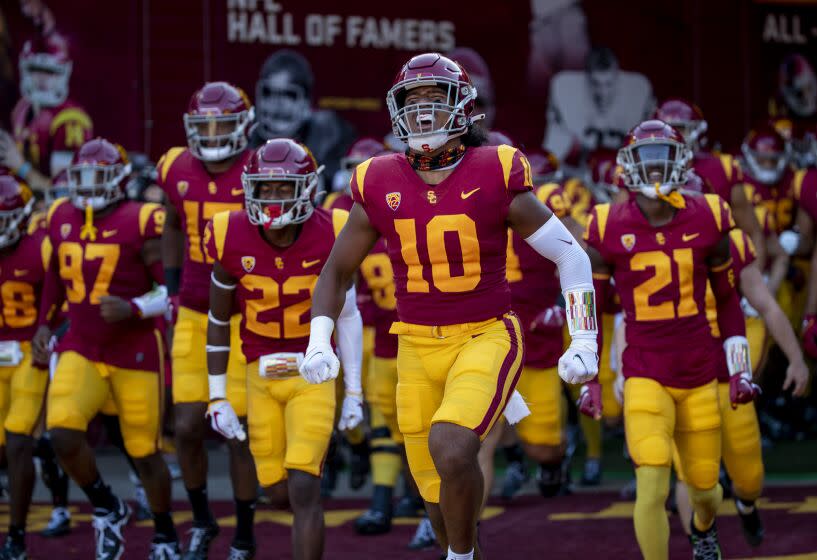 LOS ANGELES, CA - OCTOBER 8, 2022: USC Trojans wide receiver Kyron Hudson (10) leads the team out.