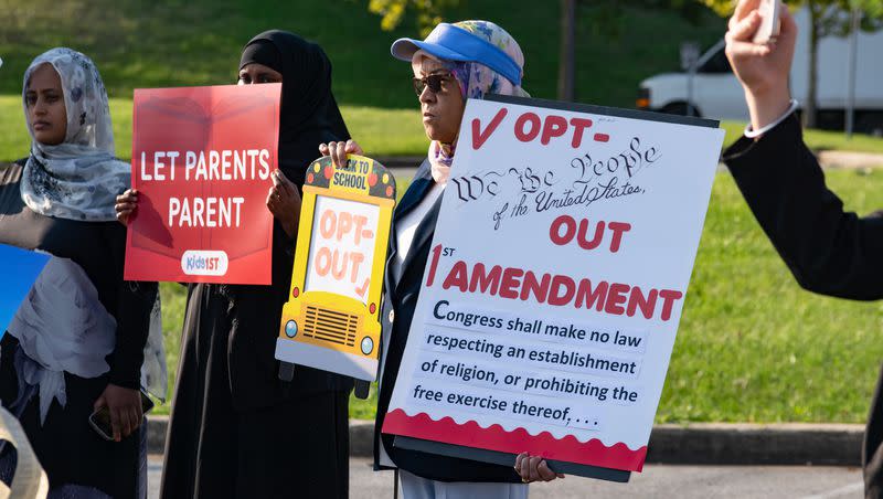 Parents supporting a lawsuit that seeks to enforce Maryland law requiring that parents be notified and have the option to opt out their children from lessons about sexuality rally in Montgomery County, Maryland, on Aug. 9, 2023.