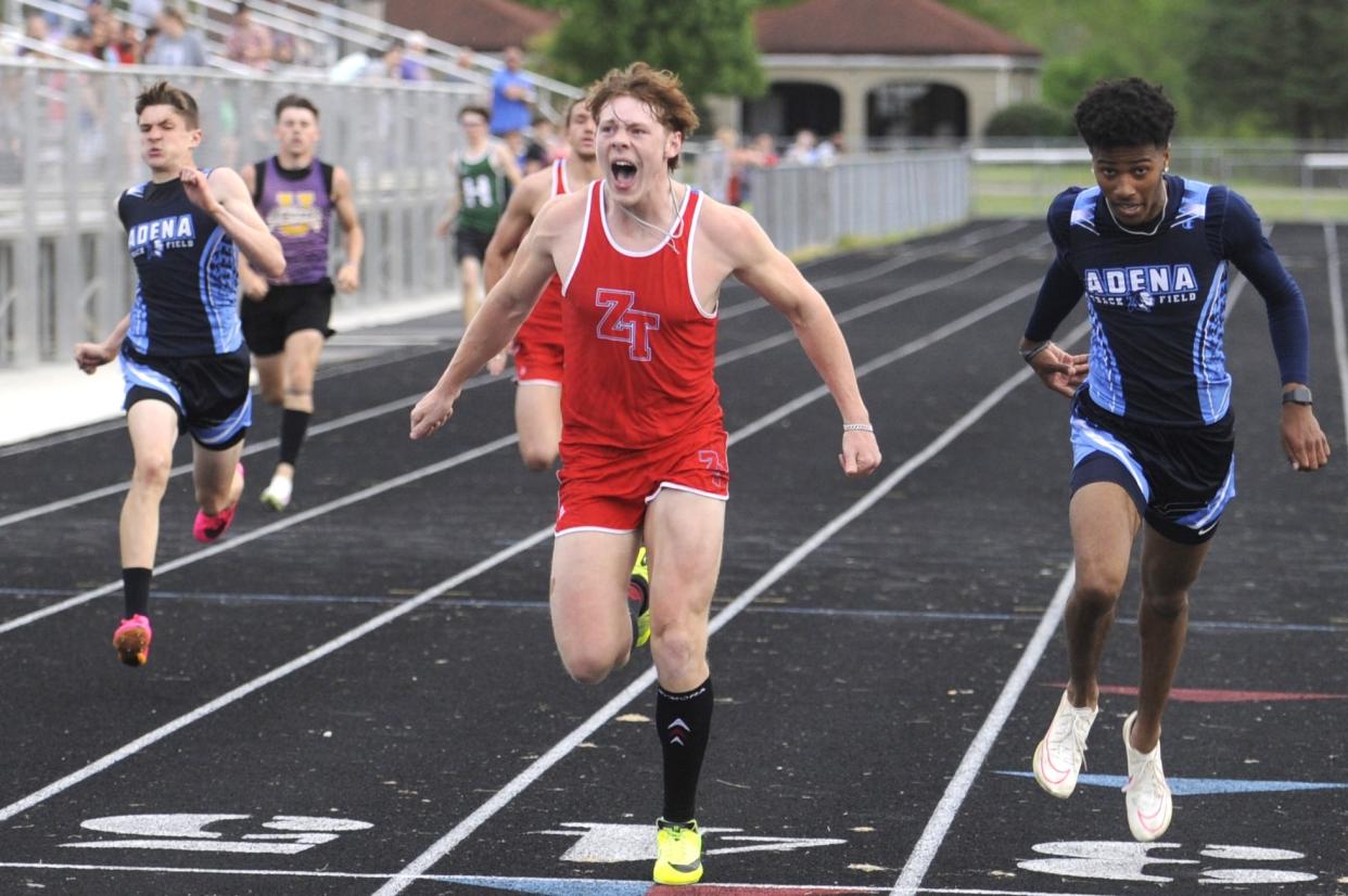 Zane Trace's Peyton Dotson celebrates as he wins the boys 200-meter dash at the Ross County Invitational track and field meet at Bostic Field on May 1, 2024, in Frankfort, Ohio. Zane Trace took home the boys' title and Adena won the girls title.