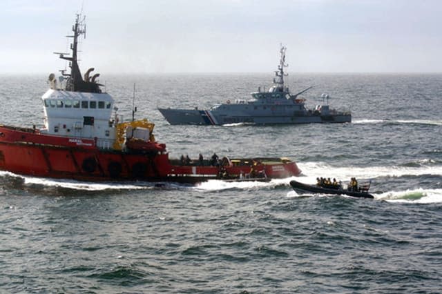 National Crime Agency handout photo dated 23/04/15 of the ocean-going tug MV Hamal (left) as it was intercepted by the frigate HMS Somerset and Border Force cutter Valiant (right) about 100 miles east of the Aberdeenshire. Cocaine which could be worth more than ï¿½500 million has been recovered from a ship intercepted at sea in what is believed to be the UK's biggest class-A drug seizure. PRESS ASSOCIATION Photo. Issue date: Thursday April 30, 2015. More than three tonnes of the drug were recovered from the MV Hamal in the North Sea in a joint operation involving the National Crime Agency (NCA) Border Force and Royal Navy. See PA story SEA Cocaine. Photo credit should read: NCA/PA WireNOTE TO EDITORS: This handout photo may only be used in for editorial reporting purposes for the contemporaneous illustration of events, things or the people in the image or facts mentioned in the caption. Reuse of the picture may require further permission from the copyright holder.