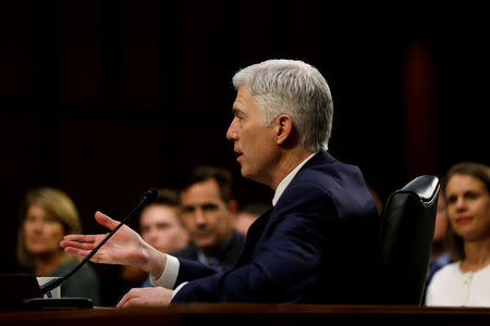 FILE PHOTO: Supreme Court nominee judge Neil Gorsuch testifies during the third day of his Senate Judiciary Committee confirmation hearing on Capitol Hill in Washington, U.S. on March 22, 2017. REUTERS/Jonathan Ernst/File Photo