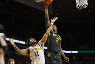 Baylor guard Devonte Bandoo (2) shoots over Iowa State guard Prentiss Nixon (11) during the second half of an NCAA college basketball game Wednesday, Jan. 29, 2020, in Ames, Iowa. Baylor won 67-53. (AP Photo/Charlie Neibergall)