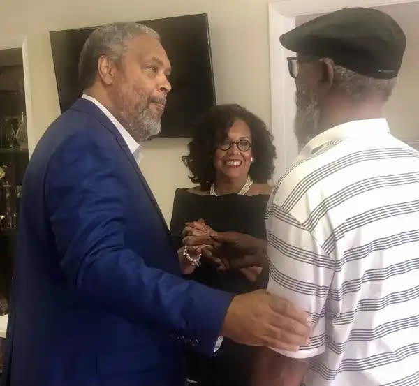 Academy Award winner Kevin Willmott, left, a native of Junction City, greeted his childhood friend, Pev Stevens as Pamela Johnson-Betts looked on Monday during an event at which Willmott spoke celebrating the 60th anniversary of the Aug. 28, 1963, March on Washington for Jobs and Freedom, where the Rev. Dr. Martin Luther King Jr. gave his famous "I Have a Dream" speech.