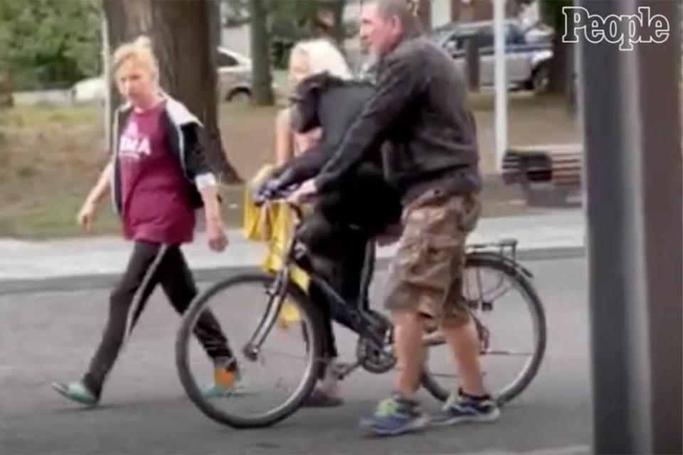 Chimpanzee Escapee on bike