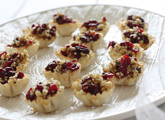 <strong>Get the <a href="http://www.skinnytaste.com/2012/11/skinny-baked-brie-phyllo-cups-with.html">Baked Brie Phyllo Cups With Craisins And Walnuts recipe</a> by Skinny Taste</strong>