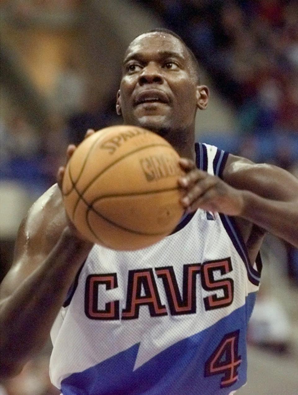 Cleveland Cavaliers forward Shawn Kemp lines up a free throw against the Utah Jazz Dec. 21 1997 at Gund Arena in Cleveland.