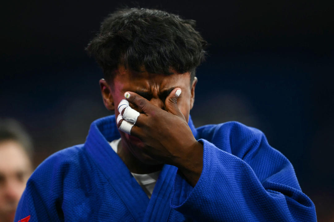 Mexico's Prisca Awiti Alcaraz (Blue) reacts after beating Croatia's Katarina Kristo in the judo women's -63kg semi-final bout of the Paris 2024 Olympic Games at the Champ-de-Mars Arena, in Paris on July 30, 2024. (Photo by Luis ROBAYO / AFP) (Photo by LUIS ROBAYO/AFP via Getty Images)