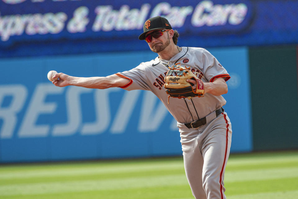 San Francisco Giants' Brett Wisely throws out Cleveland Guardians' Bo Naylor during the sixth inning of a baseball game in Cleveland, Saturday, July 6, 2024. (AP Photo/Phil Long)
