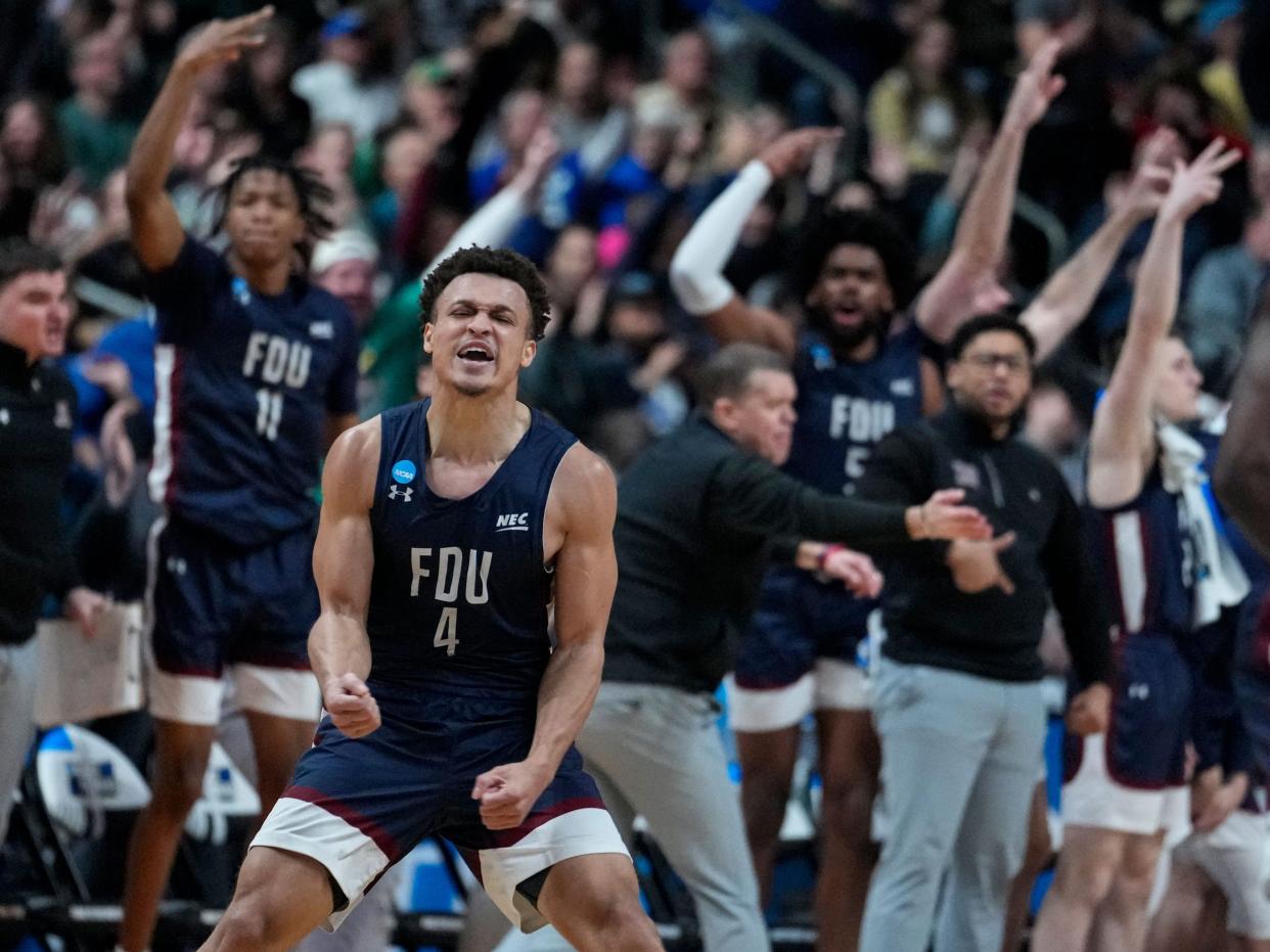 Fairleigh Dickinson guard Grant Singleton celebrates after a basket against Purdue.