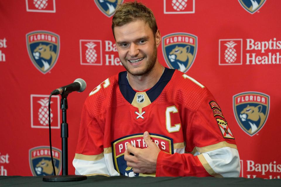 Florida Panthers' Aleksander Barkov gestures during the NHL hockey team's media day, Wednesday, Sept. 20, 2023, in Sunrise, Fla. (AP Photo/Marta Lavandier)