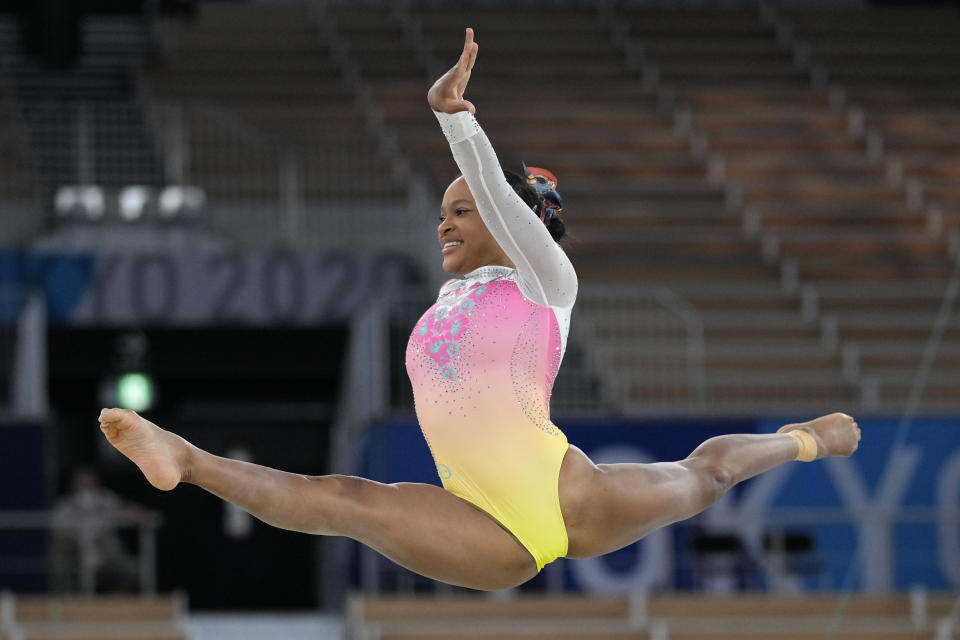 Rebeca Andrade, of Brazil, performs on the floor during the artistic gymnastics women's apparatus final at the 2020 Summer Olympics, Monday, Aug. 2, 2021, in Tokyo, Japan. (AP Photo/Ashley Landis)