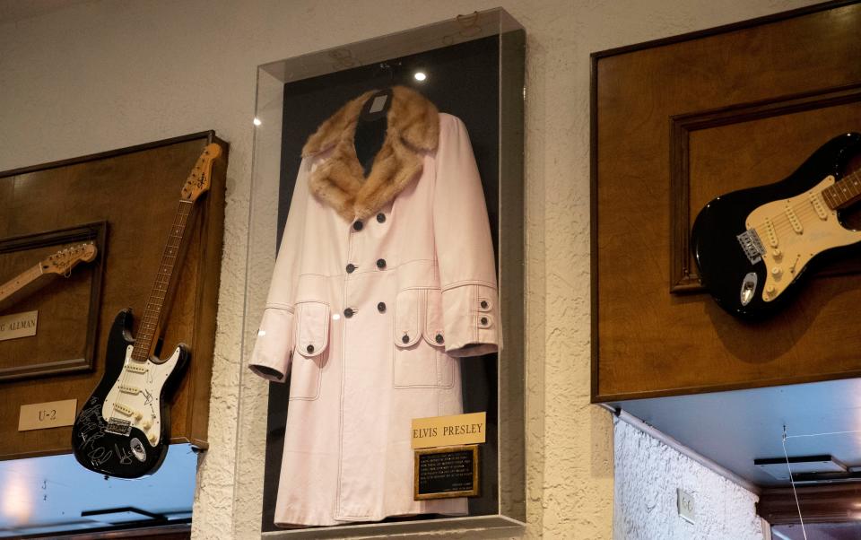 A coat owned by Elvis Presley in the early 1970s hangs on the wall at Lansky Brothers on Wednesday, July 27, 2022, at the store’s location in The Peabody Memphis. Lansky Brothers is famous for styling Memphis icons, including Elvis Presley, Isaac Hayes and David Porter. 