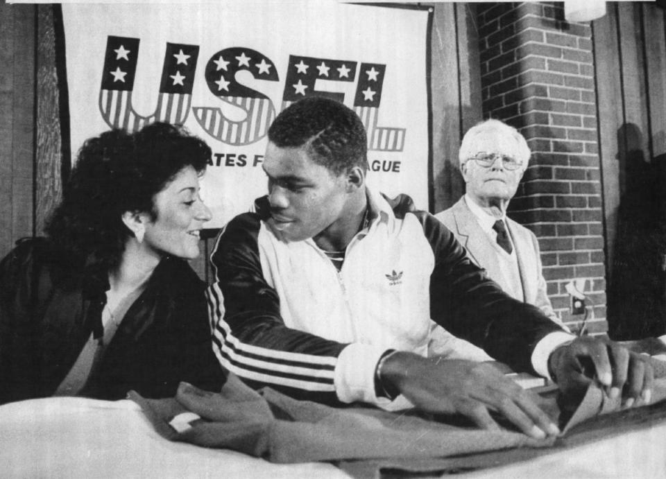 1982 Heisman winner Herschel Walker speaks with the media after joining the USFL's New Jersey Generals. (Sporting News via Getty Images via Getty Images)