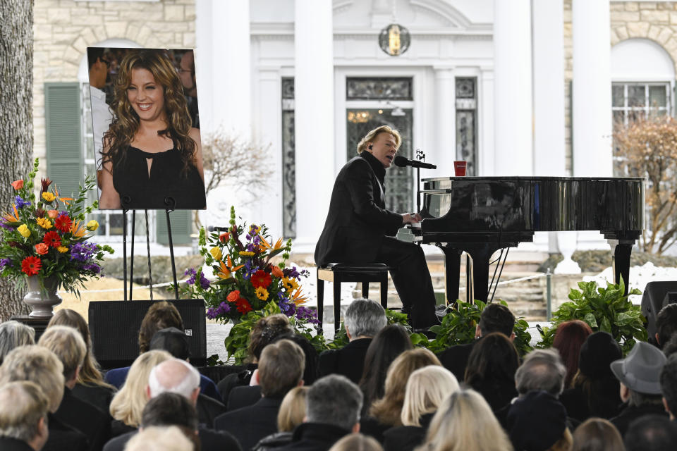 Axl Rose performs during a memorial service for Lisa Marie Presley Sunday, Jan. 22, 2023, in Memphis, Tenn. She died Jan. 12 after being hospitalized for a medical emergency and was buried on the property next to her son Benjamin Keough, and near her father Elvis Presley and his two parents. (AP Photo/John Amis)