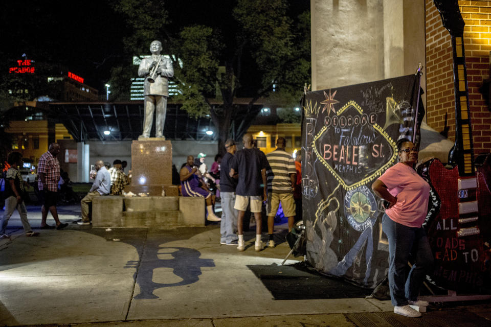 The scene around Handy Park on Beale Street.&nbsp;The street, which is now known for its nightlife, flourished as&nbsp;a black-owned business district in the late 19th century. (Photo: Andrea Morales for HuffPost)