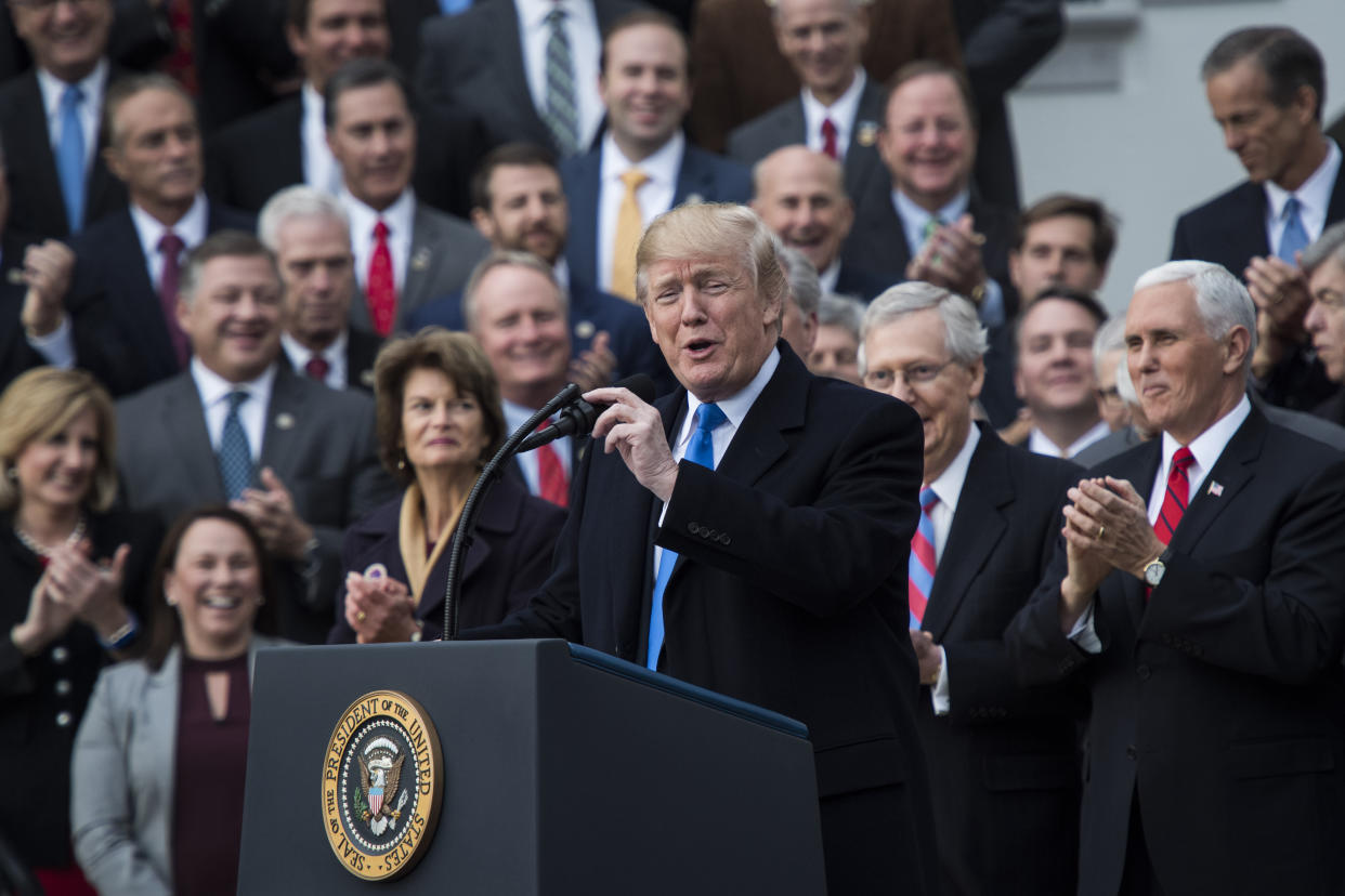 President Donald Trump praises the Republican tax cut on Dec. 20. (Photo: The Washington Post via Getty Images)