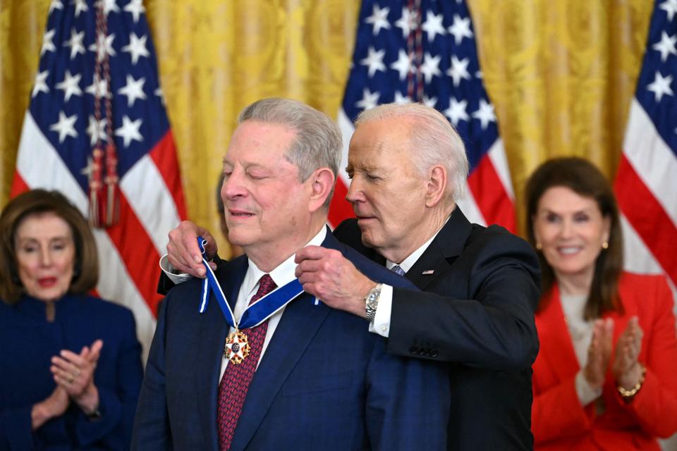Former Vice President Al Gore (L) in the East Room of the White House in Washington, DC, on May 3, 2024.
