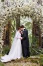 <p>In a fairy-tale-like wedding ceremony, Bella and Edward were married in the forest in a scene that upset only Team Jacob. Kristen Stewart wore a stunningly simple, long-sleeve dress with an elaborate lace back.<br></p>