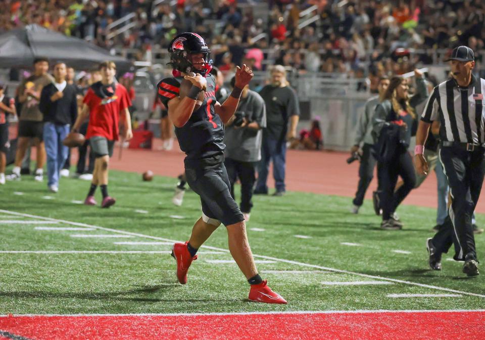 Rio Mesa quarterback JJ Bittner scores a touchdown during a 34-13 win over Buena on Oct. 6.