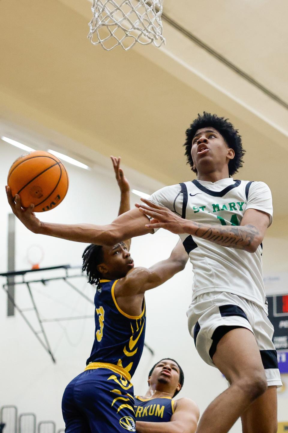 Rams Cayden Ward(14) switches hands mid-flight during their 80-57 loss against Inderkum High of Sacramento at the Super Saturday Showcase event, held at Blanchard Gymnasium on the Delta College campus in Stockton, CA