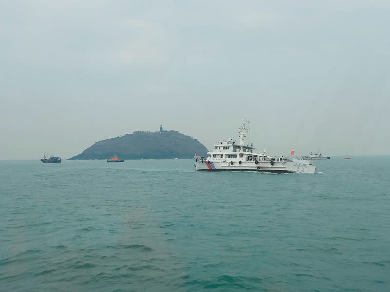 Taiwan's coast guard works during a rescue operation after a Chinese fishing boat capsized near Taiwan-controlled Kinmen islands