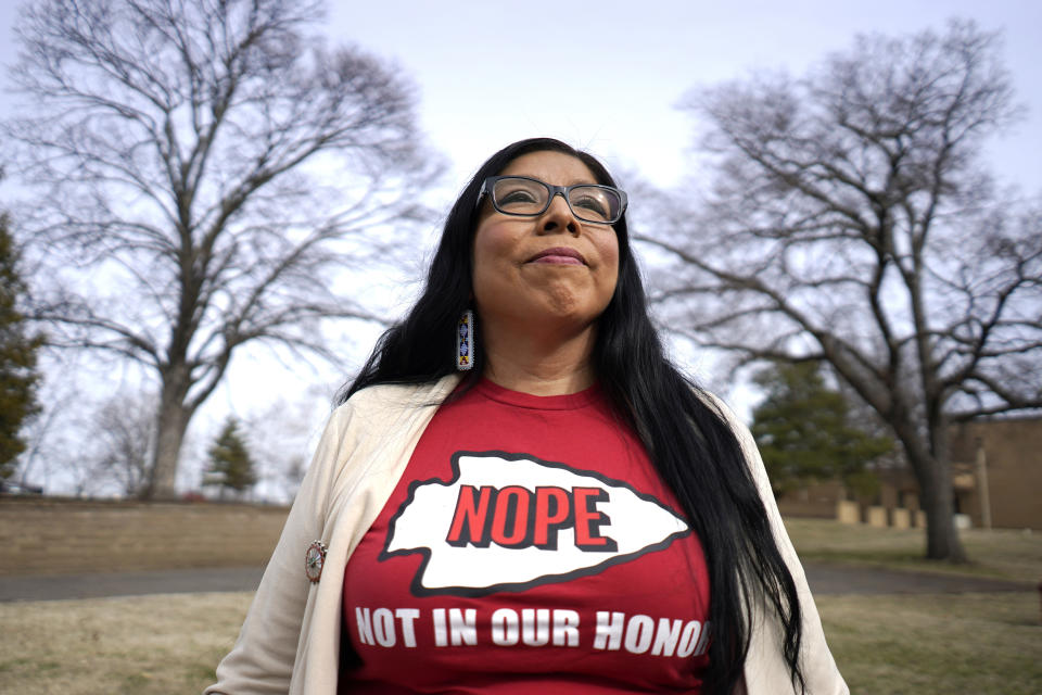 Rhonda LeValdo poses Tuesday, Feb. 6, 2024, in Lawrence, Kan. The Kansas City Chiefs, her hometown team and the focus of her protest, are playing in the Super Bowl this weekend. Levaldo is renewing her call for the team to change its name and ditch its logo and gametime rituals that she and other activists say are offensive. (AP Photo/Ed Zurga)