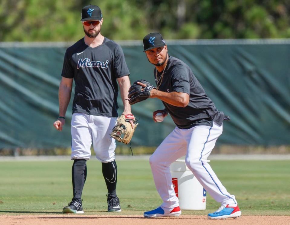 Miami Marlins infielder Luis Arraez goes through a fielding drill during spring training at Roger Dean Chevrolet Stadium in Jupiter, Florida on Tuesday, February 21, 2023.