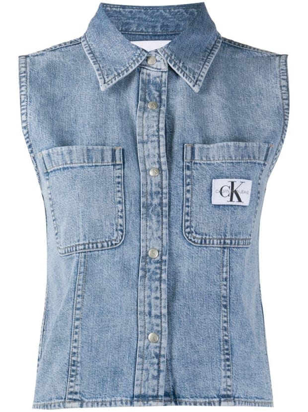 <p>Calvin Klein Jeans Logo Patch Denim Shirt, $83 (from $98), <a href="https://rstyle.me/+UVNaJF2res4Rt_Fd8tcZiw" rel="nofollow noopener" target="_blank" data-ylk="slk:available here;elm:context_link;itc:0;sec:content-canvas" class="link ">available here</a> (sizes XS-M). </p>