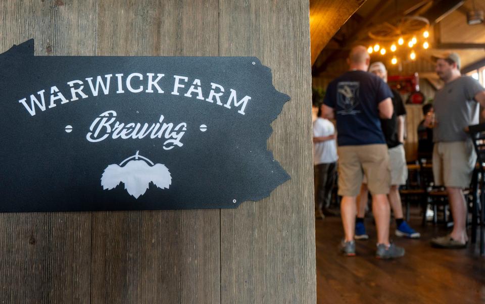 An event celebrating the collaboration beer between more than 26 local breweries in Bucks County at Warwick Farm Brewing in Jamison on Tuesday, Aug. 1, 2023.