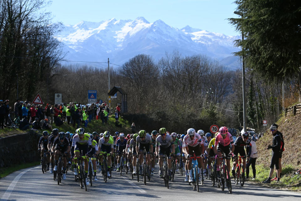 ORBASSANO ITALY  MARCH 15 LR Loc Vliegen of Belgium and Team Intermarch  Circus  Wanty Tobias Ludvigsson of Sweden and Q365 Pro Cycling Team Greg Van Avermaet of Belgium and AG2R Citron Team James Shaw of The United Kingdom and Team EF EducationEasyPost and a general view of the peloton competing while fans cheer during the 104th MilanoTorino 2023 a 192km one day race from Rho to Orbassano  MilanoTorino  on March 15 2023 in Orbassano Italy Photo by Tim de WaeleGetty Images