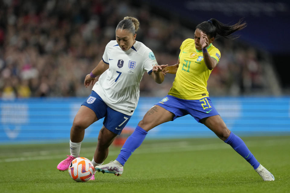 FILE - Brazil's Kerolin vies for the ball with England's Lauren James, left, during the Women's Finalissima soccer match between England and Brazil at Wembley stadium in London, Thursday, April 6, 2023. (AP Photo/Kirsty Wigglesworth, File)
