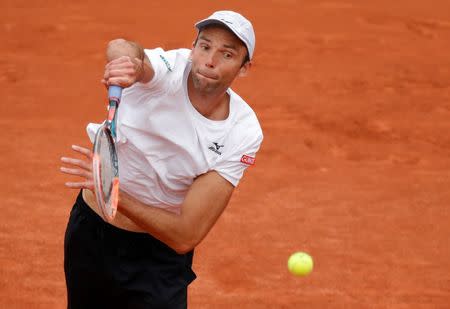 Tennis - French Open - Roland Garros - Ivo Karlovic of Croatia v Andy Murray of Britain - Paris, France - 27/05/16. Karlovic serves. REUTERS/Jacky Naegelen