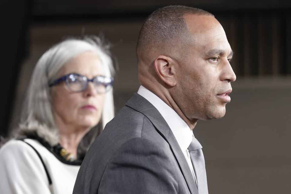 Democratic Caucus Chair Rep. Hakeem Jeffries, D-N.Y., speaks as Rep. Katherine Clark, D-Mass., right, listens during a news conference Wednesday, May 24, 2023, on Capitol Hill in Washington. (AP Photo/Mariam Zuhaib)