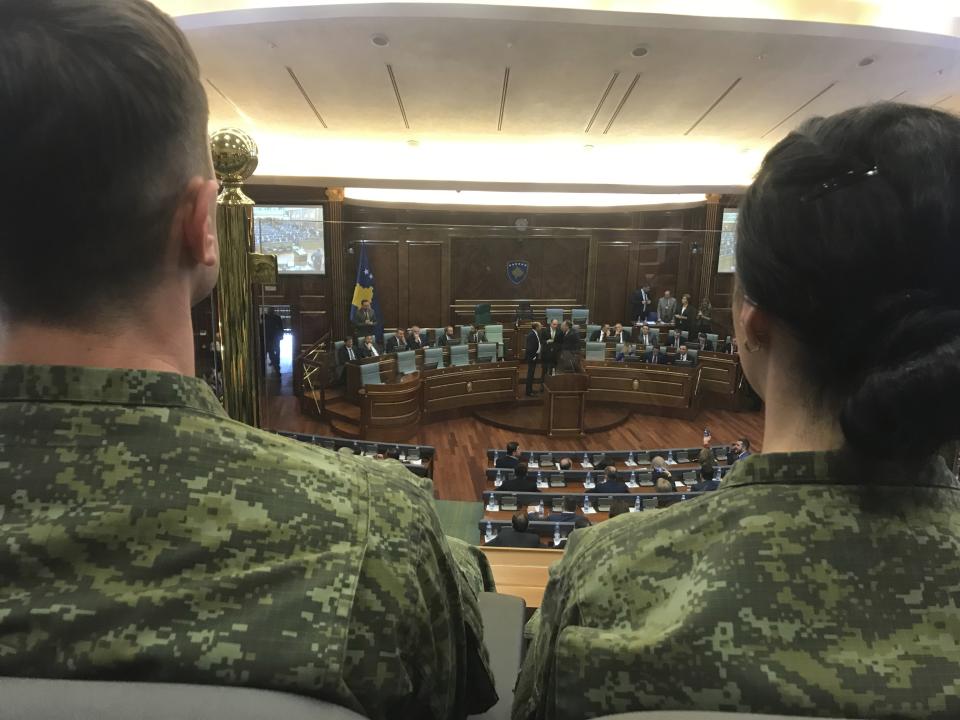 Kosovo Security Force members attend a parliamentary session to approve the formation of an army, in capital Pristina, Kosovo on Friday, Dec. 14, 2018. Kosovo's parliament convened on Friday to approve the formation of an army, a move that has angered Serbia which says it would threaten peace in the war-scarred region. (AP Photo/Florent Bajrami)