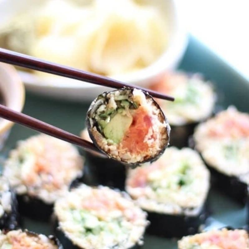 <p>Wicked Spatula</p><p>If you are looking for the perfect appetizer to serve poolside, these delicious low-carb sushi rolls are it.</p><p><strong>Get the recipe: <a href="https://www.wickedspatula.com/cauliflower-rice-spicy-tuna-rolls/" rel="nofollow noopener" target="_blank" data-ylk="slk:Cauliflower Rice Sushi Rolls;elm:context_link;itc:0;sec:content-canvas" class="link ">Cauliflower Rice Sushi Rolls</a></strong></p>