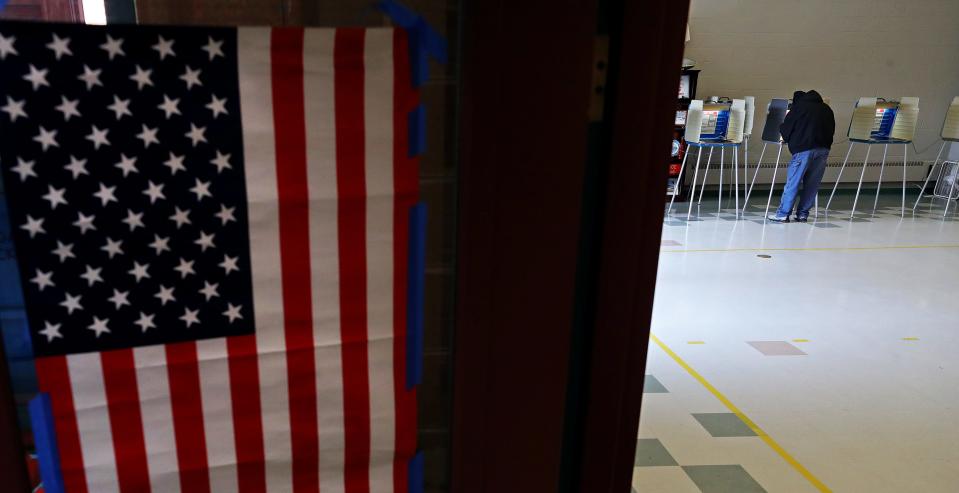 An Ellet resident casts their vote on Election Day at Ellet Community Center, Tuesday, March 19, 2024, in Akron, Ohio.