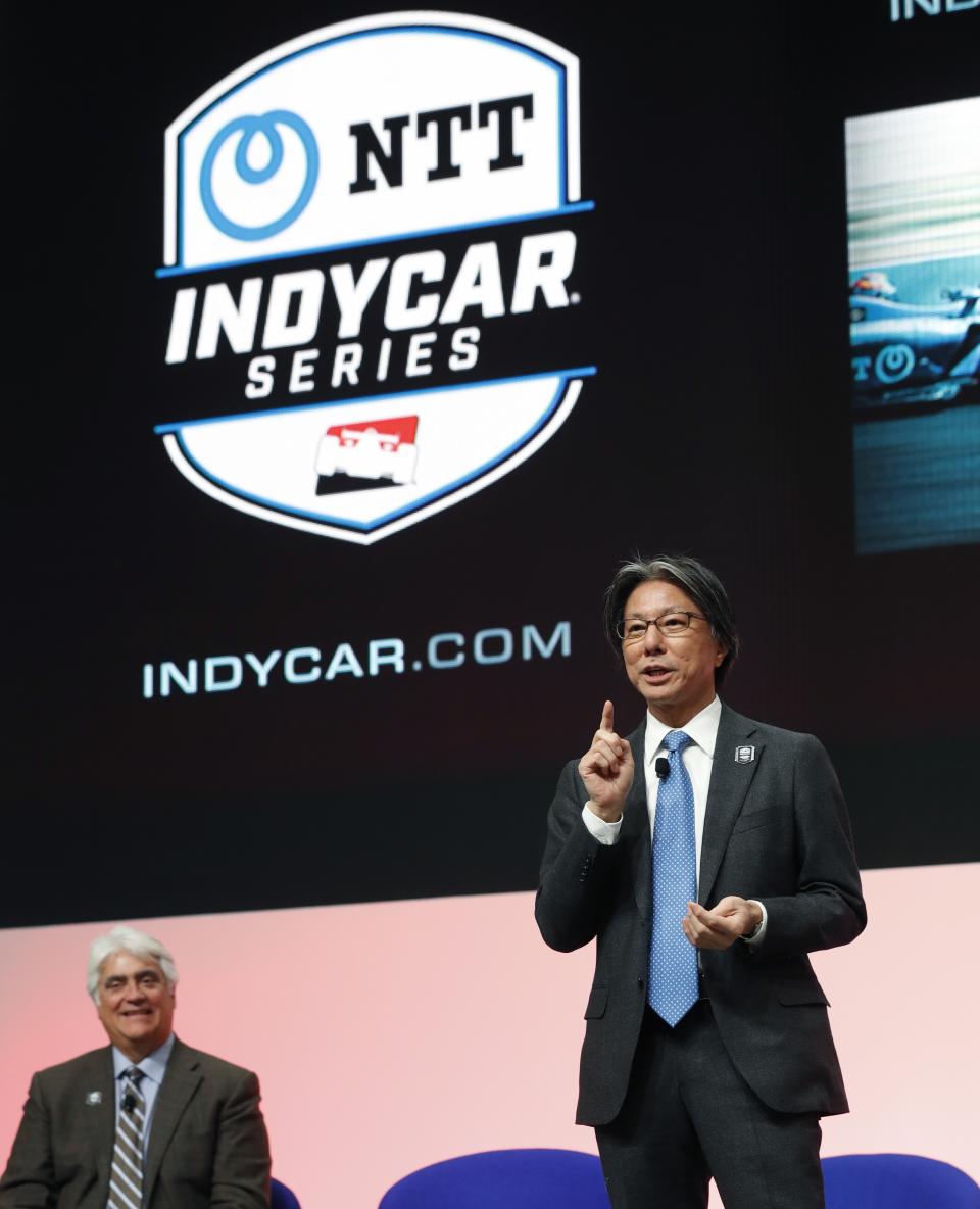 Tsuneshia Okuno, an executive vice president at NTT talks about the sponsorship deal with IndyCar Series during a news conference, Tuesday, Jan. 15, 2019 at the North American International Auto Show in Detroit. IndyCar has signed a multi-year title sponsorship deal with NTT, a global information technology and communications leader. The partnership was revealed Tuesday and makes NTT the official technology partner of the IndyCar Series, Indianapolis Motor Speedway, the Indianapolis 500 and NASCAR's Brickyard 400. NTT replaces Verizon, which was title sponsor of the series from 2014 until it ended its partnership last season. (AP Photo/Carlos Osorio)
