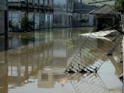 Shops are submerged in northern Jakarta in July 2019