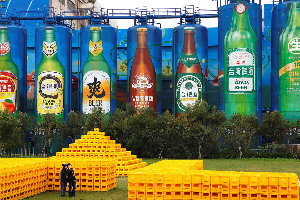 Tourists take photos at Zhunan brewery belonging to state-owned Taiwan Tobacco and Liquor Corp, whose products are included in the latest ban on Taiwan imports announced by China, in Miaoli, Taiwan, on Dec. 13, 2022.