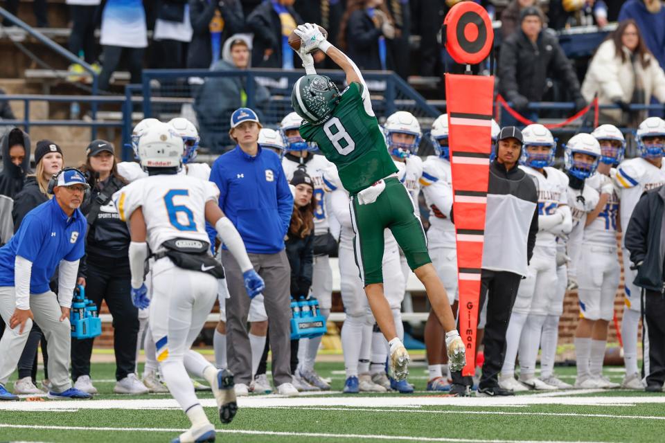 Muskogee's Kayden McGee (8) makes a catch for a first down against Stillwater during the second half of the OSSAA 6AII State Football Championship Game at UCO in Edmond, Okla. Friday, Dec. 1, 2023.