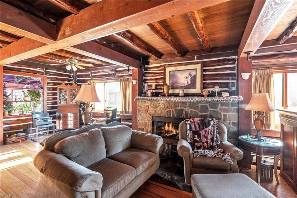 Live the rustic life in this log cabin for sale in Mentor, Ohio. (Redfin)